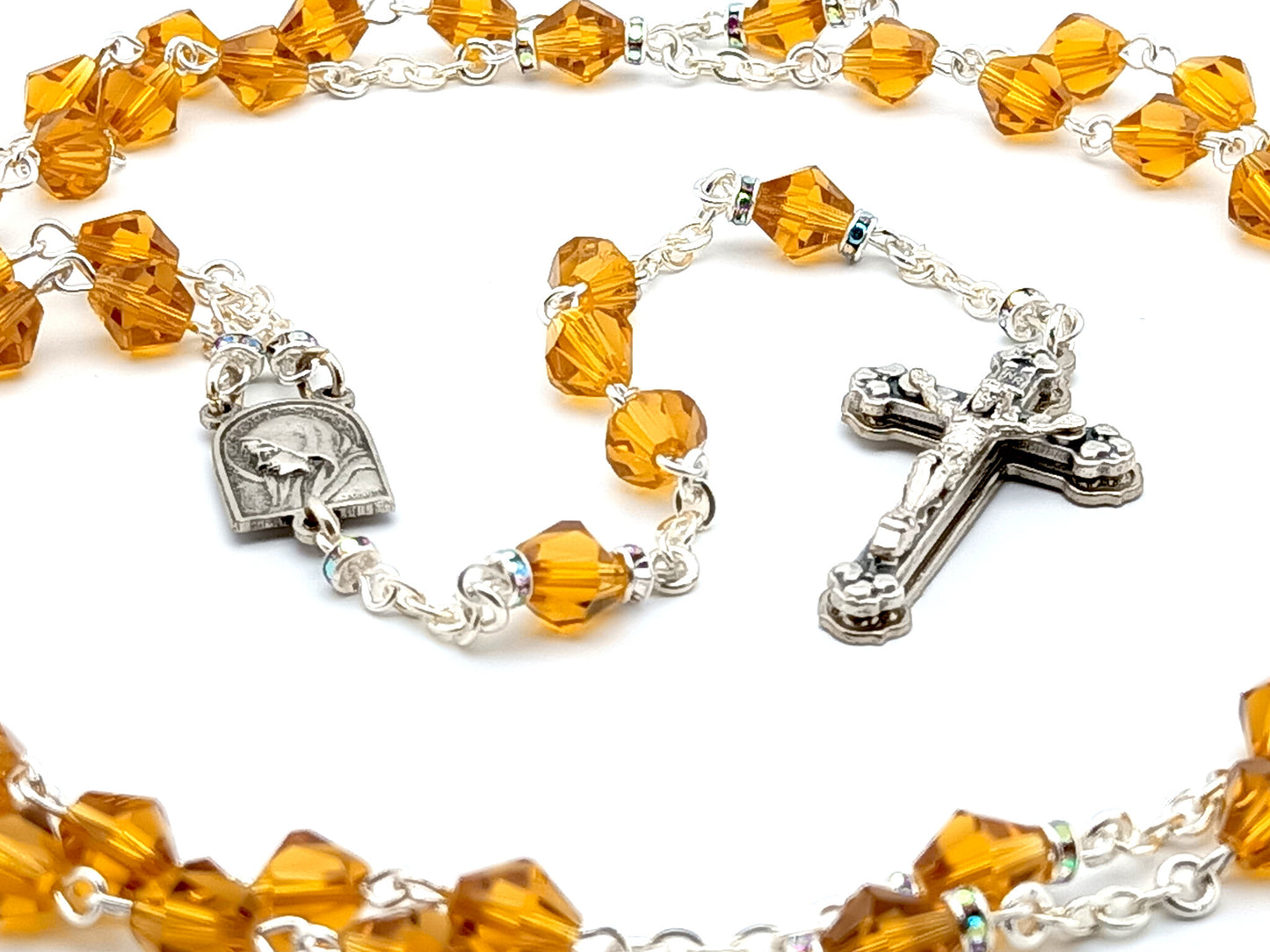 Our Lady of Lourdes and Saint Bernadette amber glass rosary.