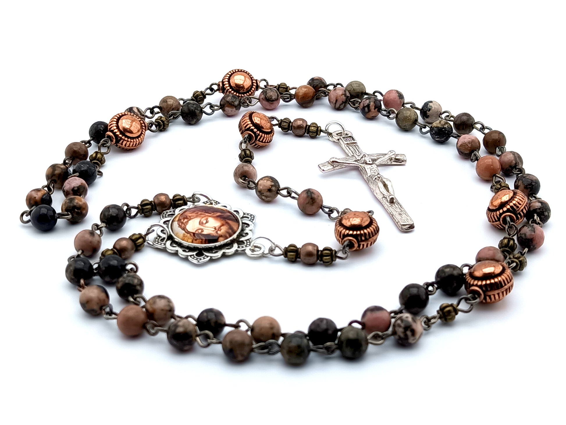 The Holy Face of Jesus unique rosary beads with rhodochrosite gemstone beads, copper pater beads, silver crucifix and picture centre medal.