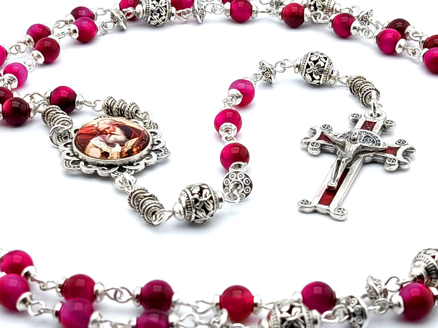 Holy Trinity unique rosary beads with pink tigers eye gemstone beads, silver pater beads, silver and red enamel Saint Benedict crucifix and picture centre medal.