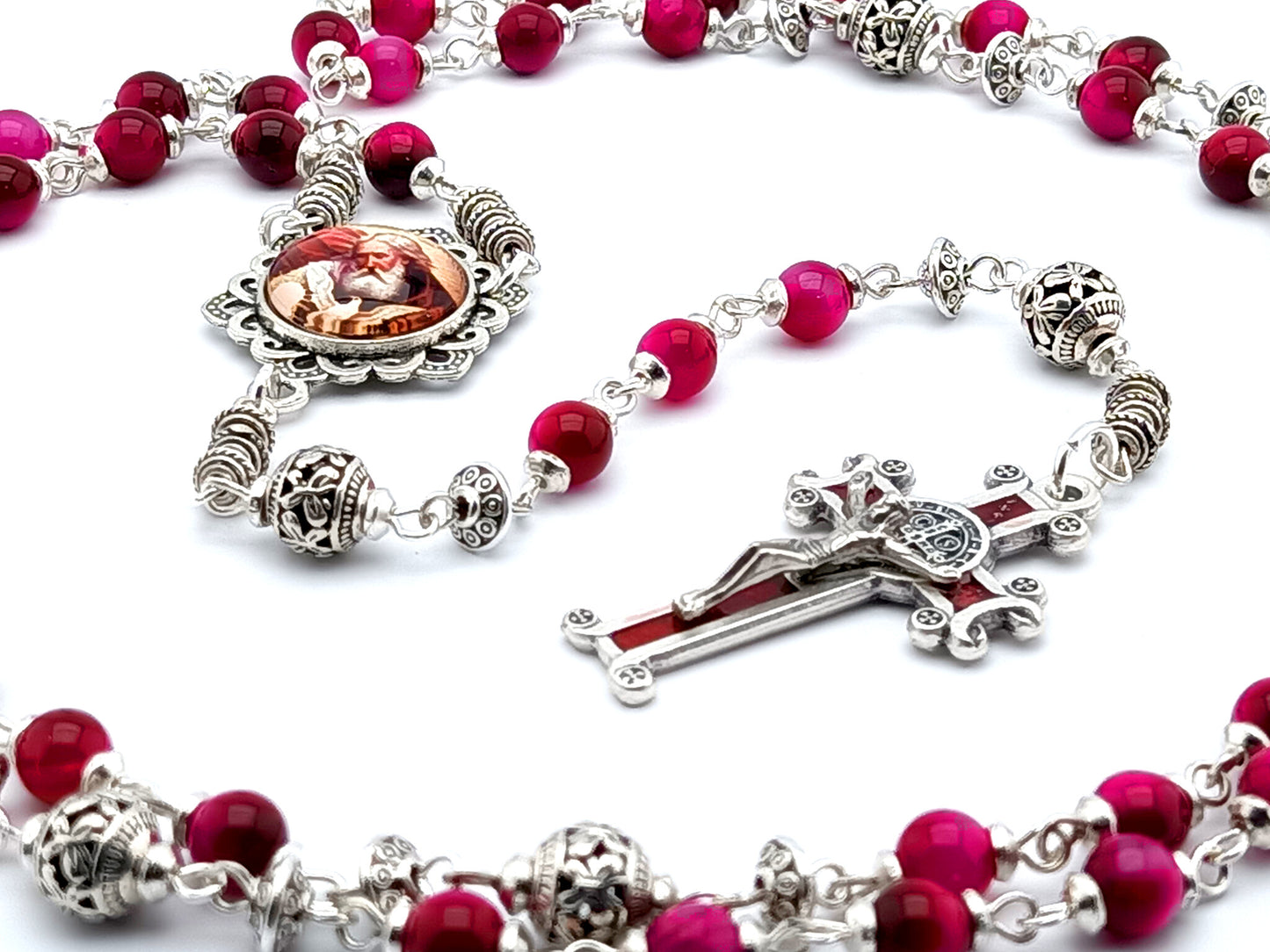 Holy Trinity unique rosary beads with pink tigers eye gemstone beads, silver pater beads, silver and red enamel Saint Benedict crucifix and picture centre medal.