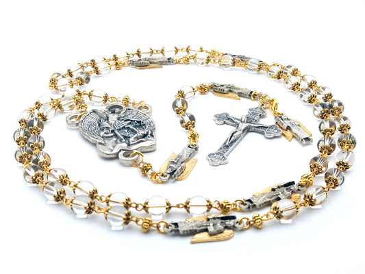 Saint Michael unique rosary beads with clear glass beads, golden bead caps, silver crucifix, centre medal and angel pater beads.