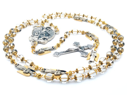 Saint Michael unique rosary beads with clear glass beads, golden bead caps, silver crucifix, centre medal and angel pater beads.