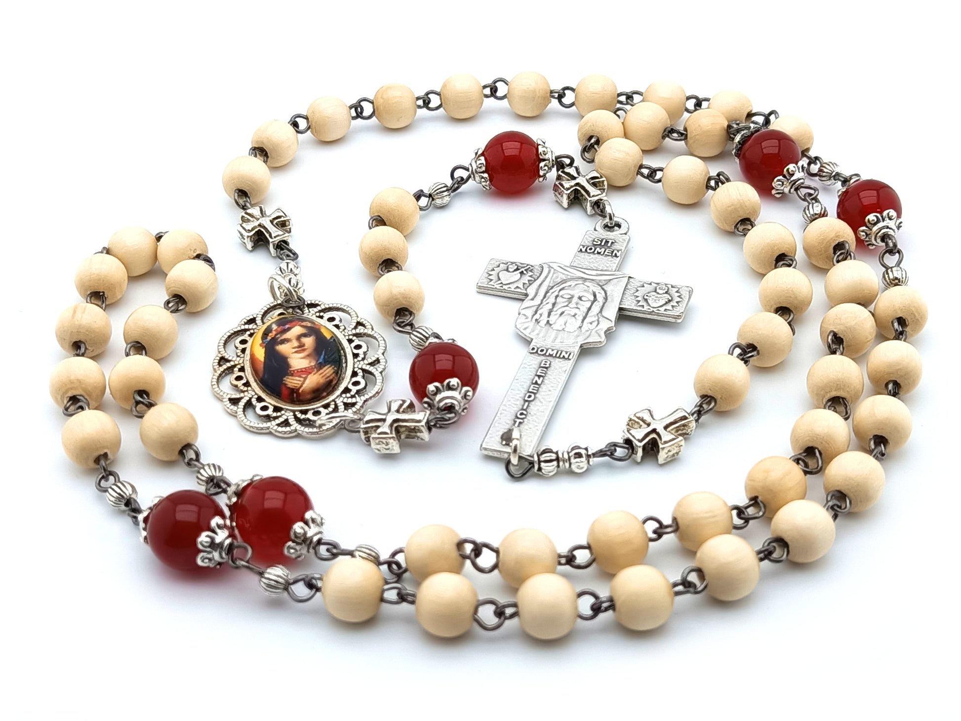 Saint Philomena circular unique rosary beads in white wood and ruby gemstone beads, picture centre medal and Holt Face crucifix.
