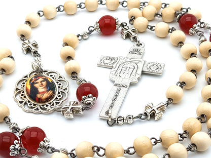 Saint Philomena circular unique rosary beads in white wood and ruby gemstone beads, picture centre medal and Holt Face crucifix.
