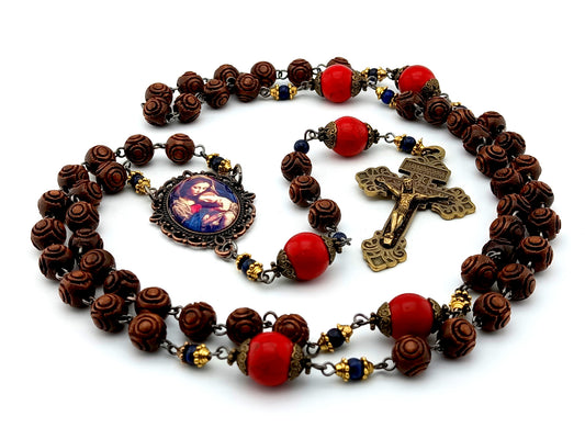 Our Lady of Divine Providence dark wood and red howlite rosary beads with Pardon Crucifix.