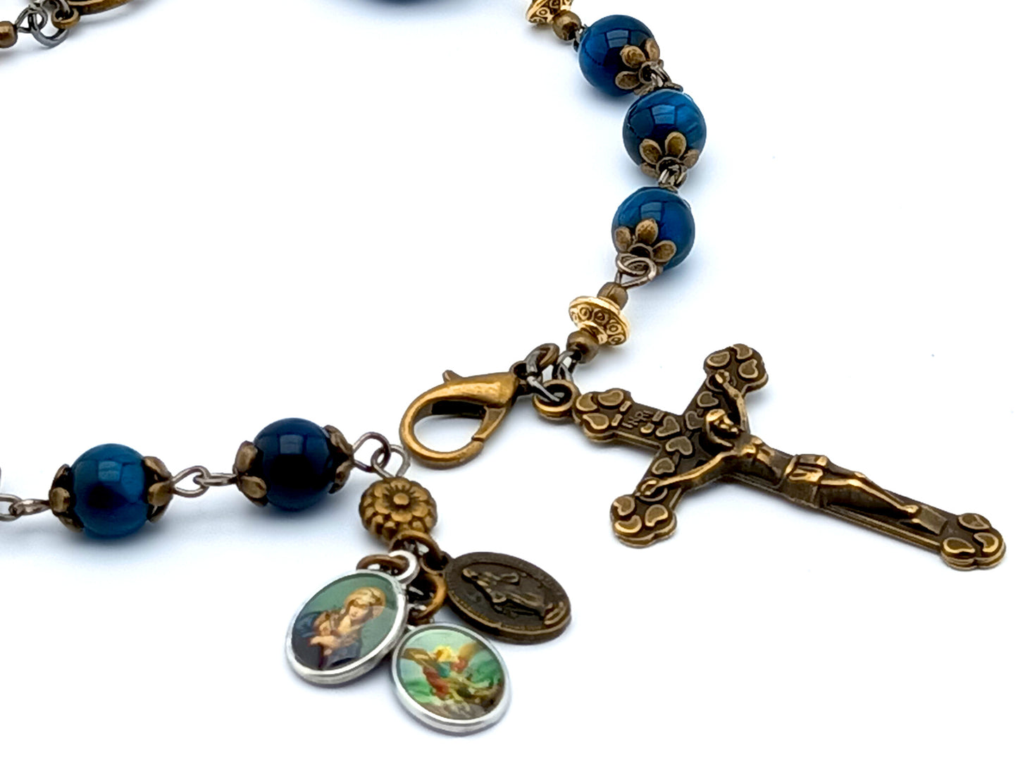 Servite Dolor rosary in blue tigers eye gemstone and bronze crucifix.