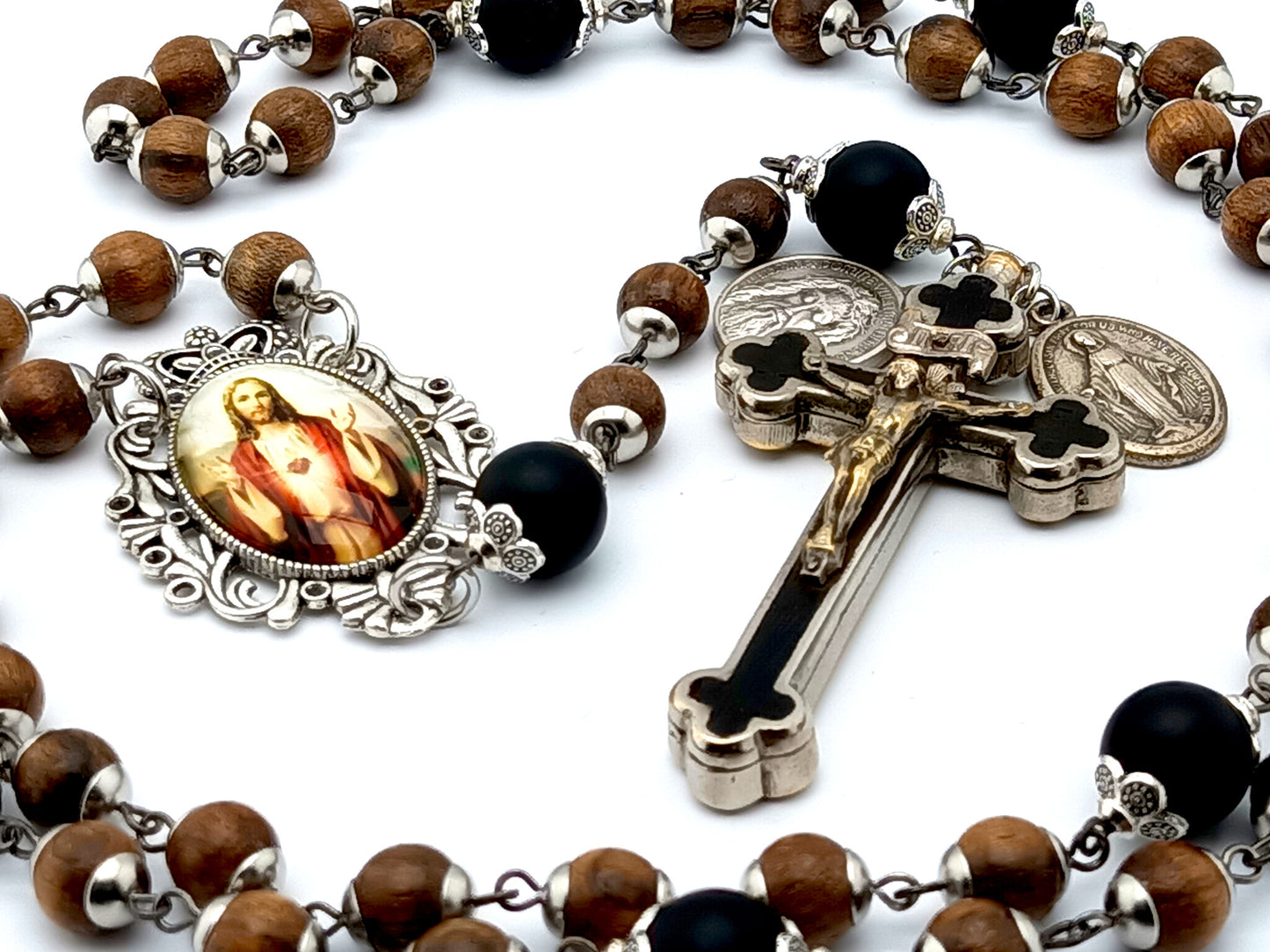 Sacred Heart dark wood and onyx rosary with clients own crucifix.