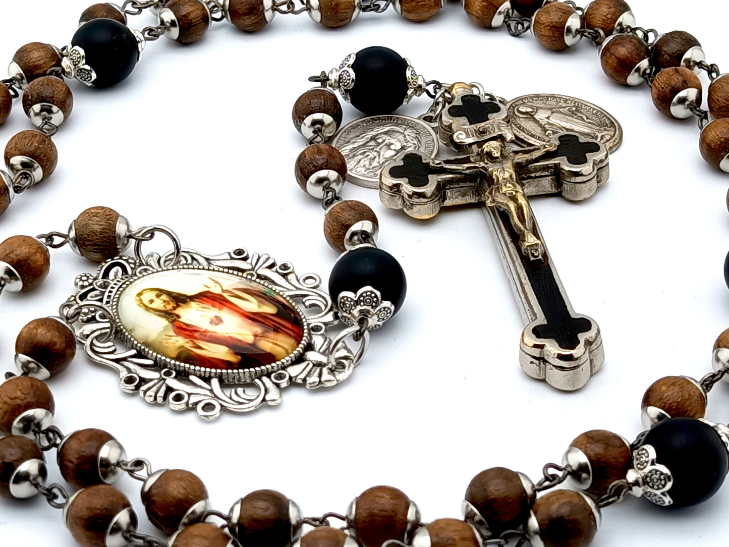 Sacred Heart dark wood and onyx rosary with clients own crucifix.