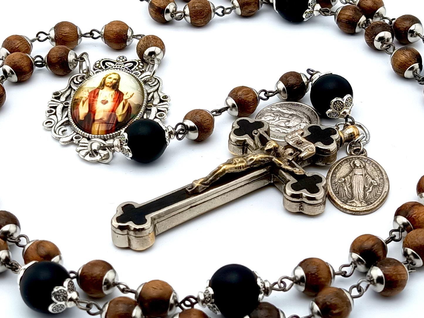 Sacred Heart dark wood and onyx rosary with clients own crucifix.