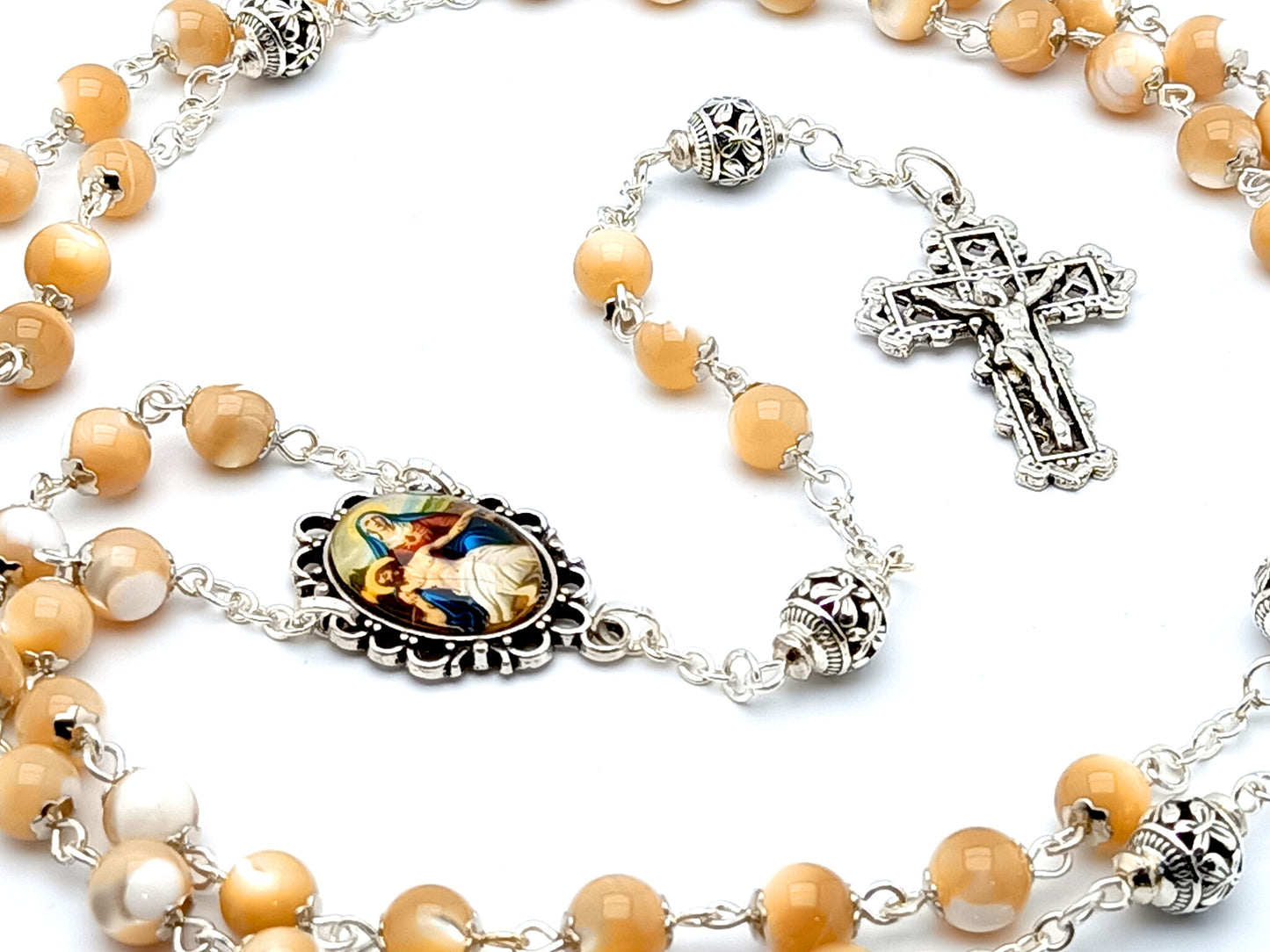 La Pieta unique rosary beads with mother of pearl and silver beads, silver crucifix and picture centre medal.