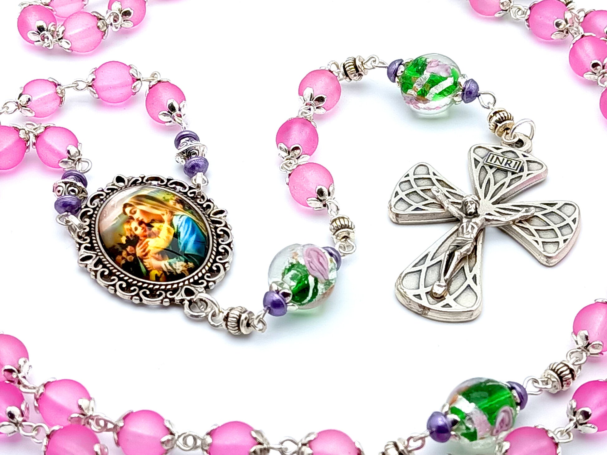 Virgin Mary unique rosary beads with pink and floral glass beads, silver harlequin crucifix and picture centre medal.