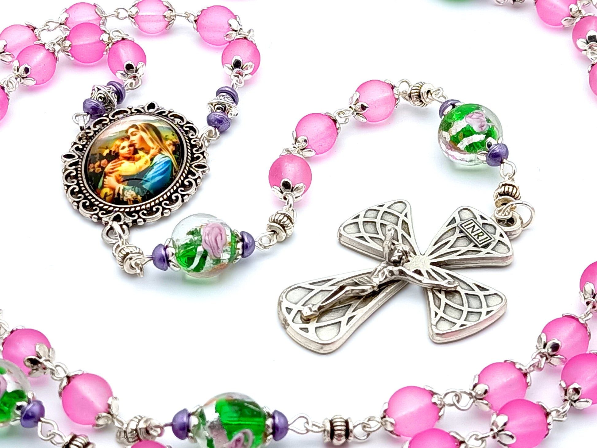 Virgin Mary unique rosary beads with pink and floral glass beads, silver harlequin crucifix and picture centre medal.