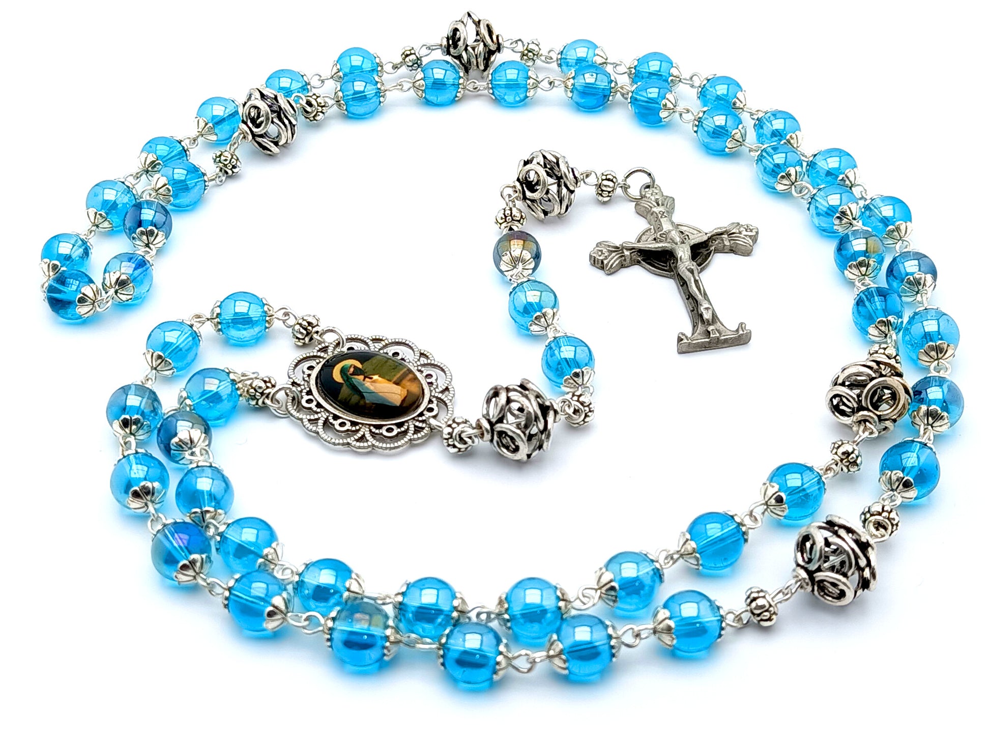 Our Lady of Guadalupe unique rosary beads with blue glass and silver beads, pewter crucifix and silver picture centre medal.