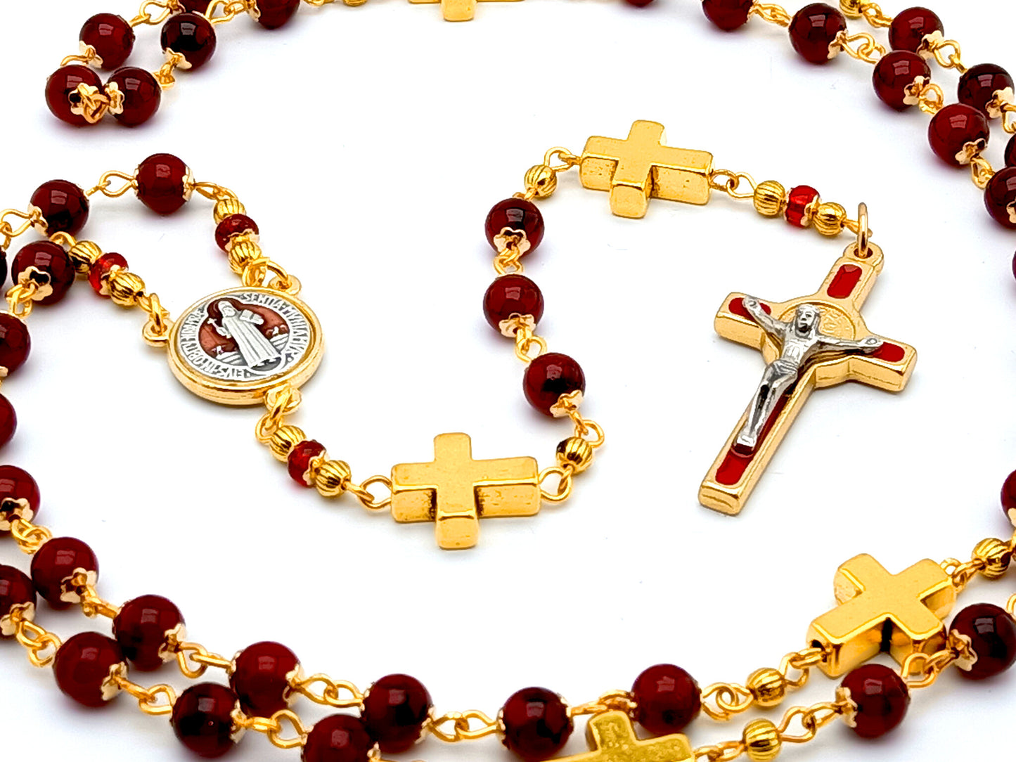 Saint Benedict unique rosary beads with deep red glass and golden cross beads, red and gold enamel crucifix and centre medal.