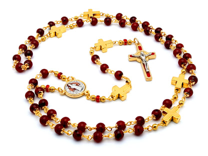 Saint Benedict unique rosary beads with deep red glass and golden cross beads, red and gold enamel crucifix and centre medal.