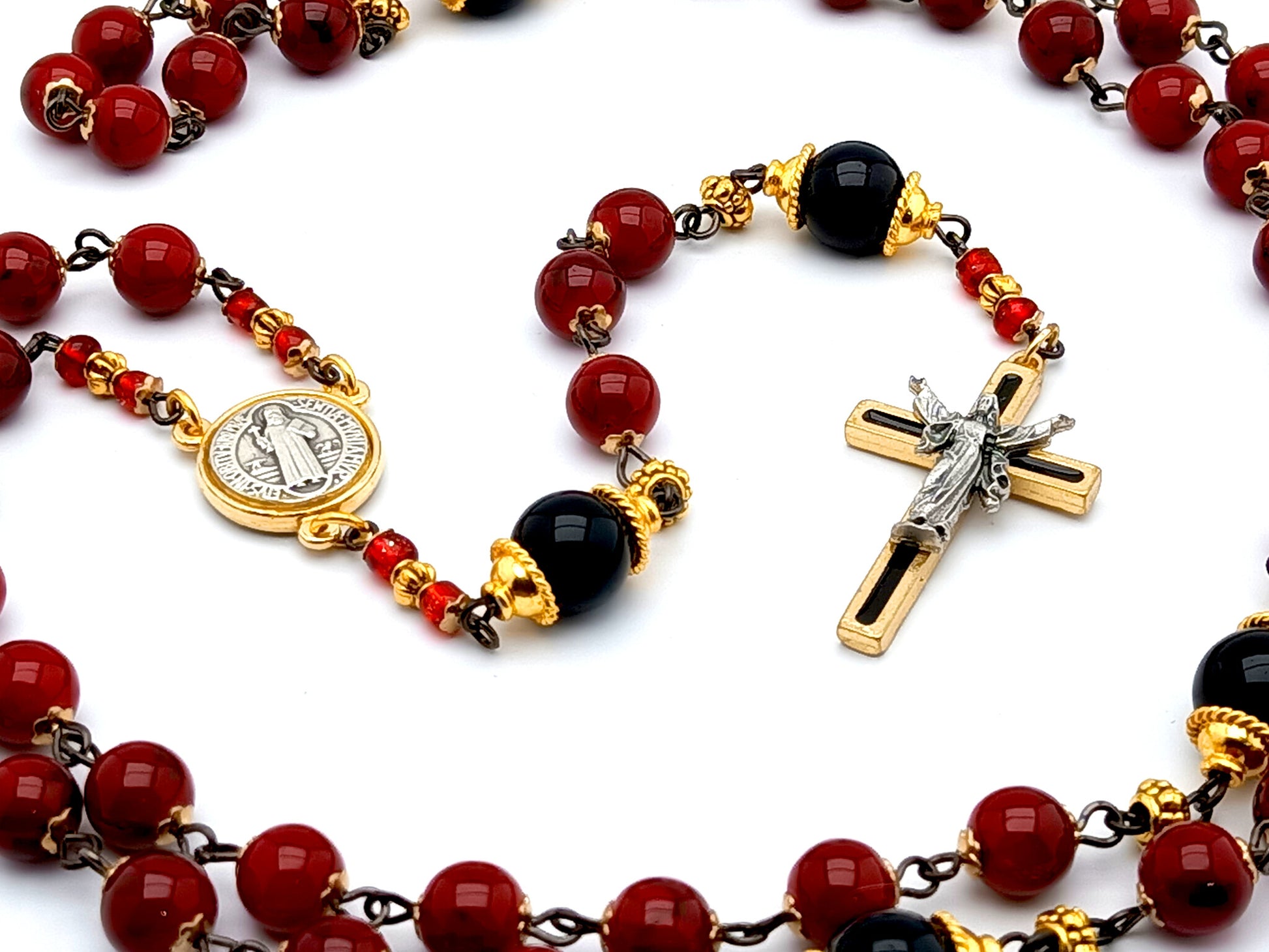 The Resurrection unique rosary beads with deep red and black glass beads, gold and black enamel crucifix and centre medal.