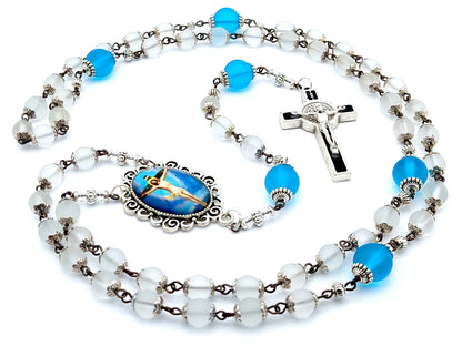 The Crucifixion unique rosary beads with frosted clear and blue glass beads, black and silver enamel crucifix and picture centre medal.