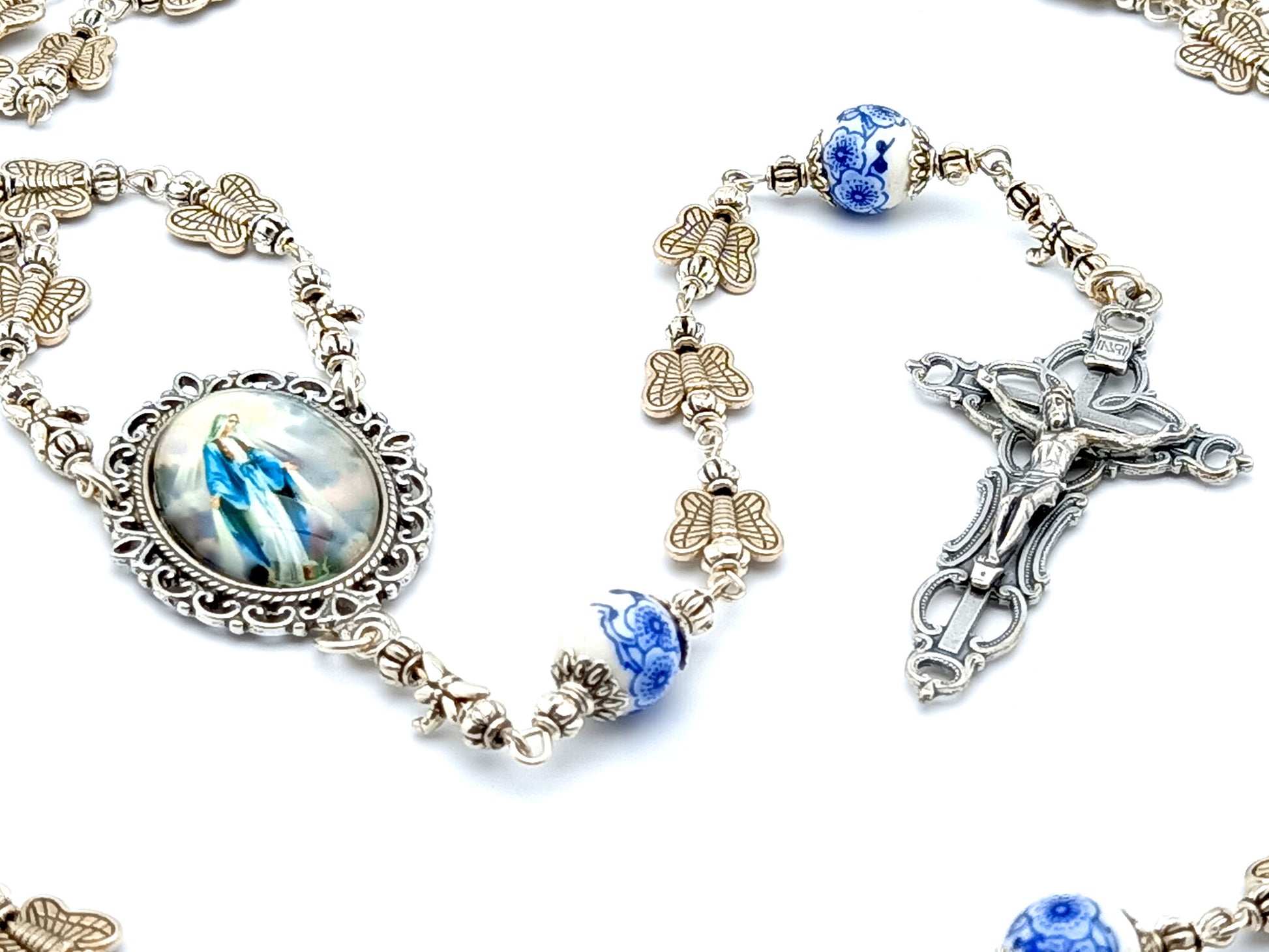 Miraculous medal unique rosary beads with silver butterfly and porcelain beads, silver crucifix and picture centre medal.