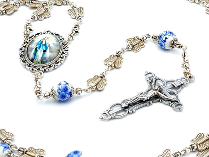 Miraculous medal unique rosary beads with silver butterfly and porcelain beads, silver crucifix and picture centre medal.