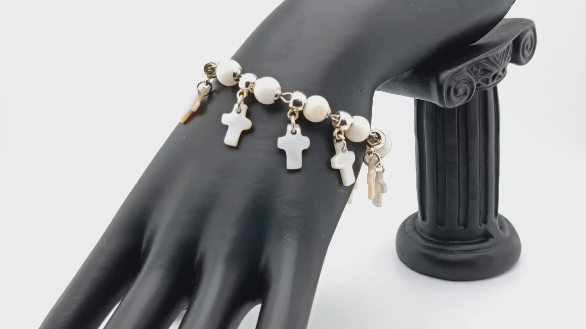 First Holy Communion unique rosary beads bracelet with mother of pearl beads and crosses, small crucifix and chalice medal.