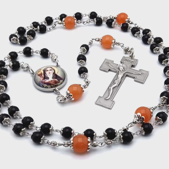 Saint Clare unique rosary beads with black onyx and tangerine gemstone beads, silver crucifix and picture centre medal.