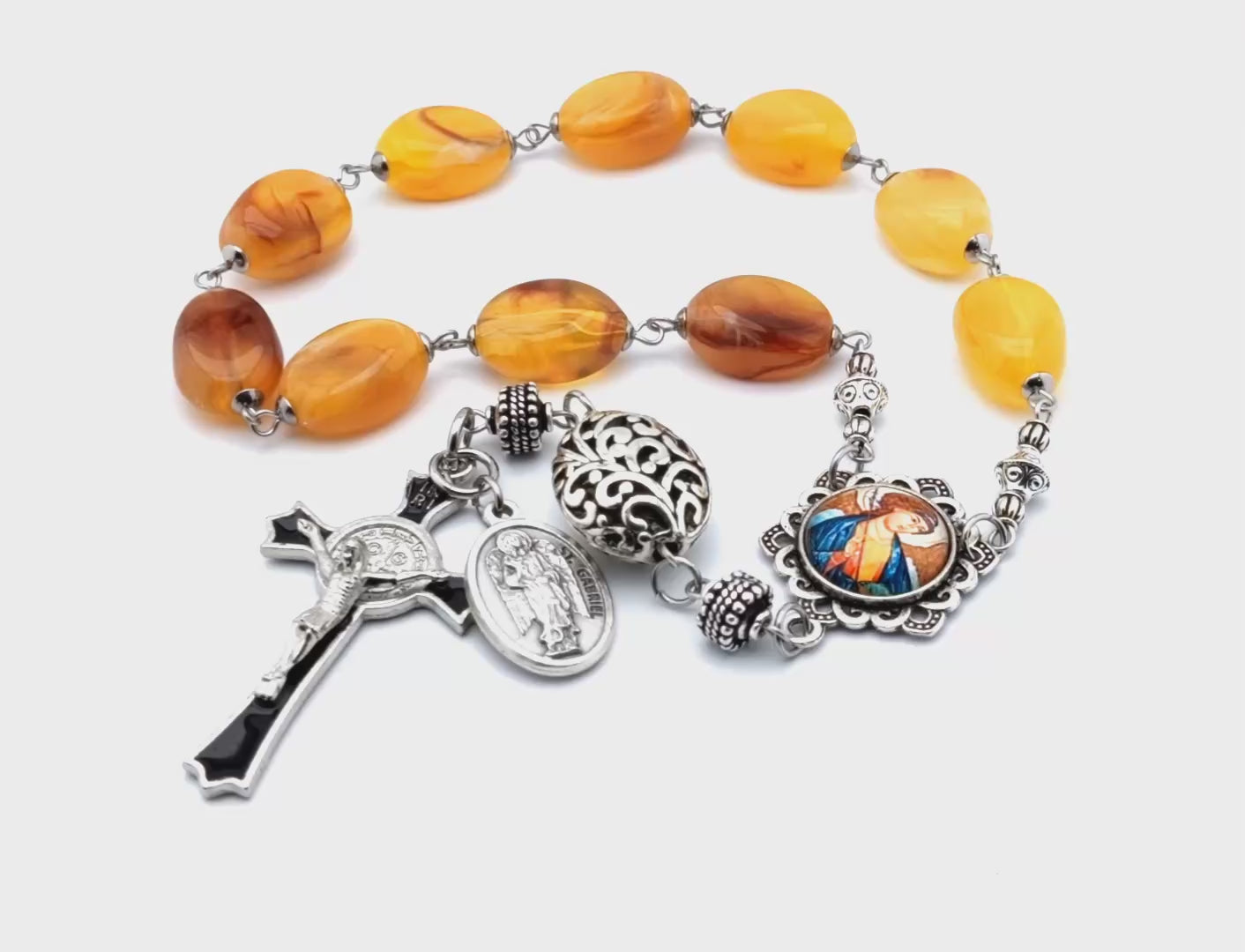 Saint Gabriel unique rosary beads single decade rosary with amber gemstone beads, silver and black enamel crucifix and picture centre medal.
