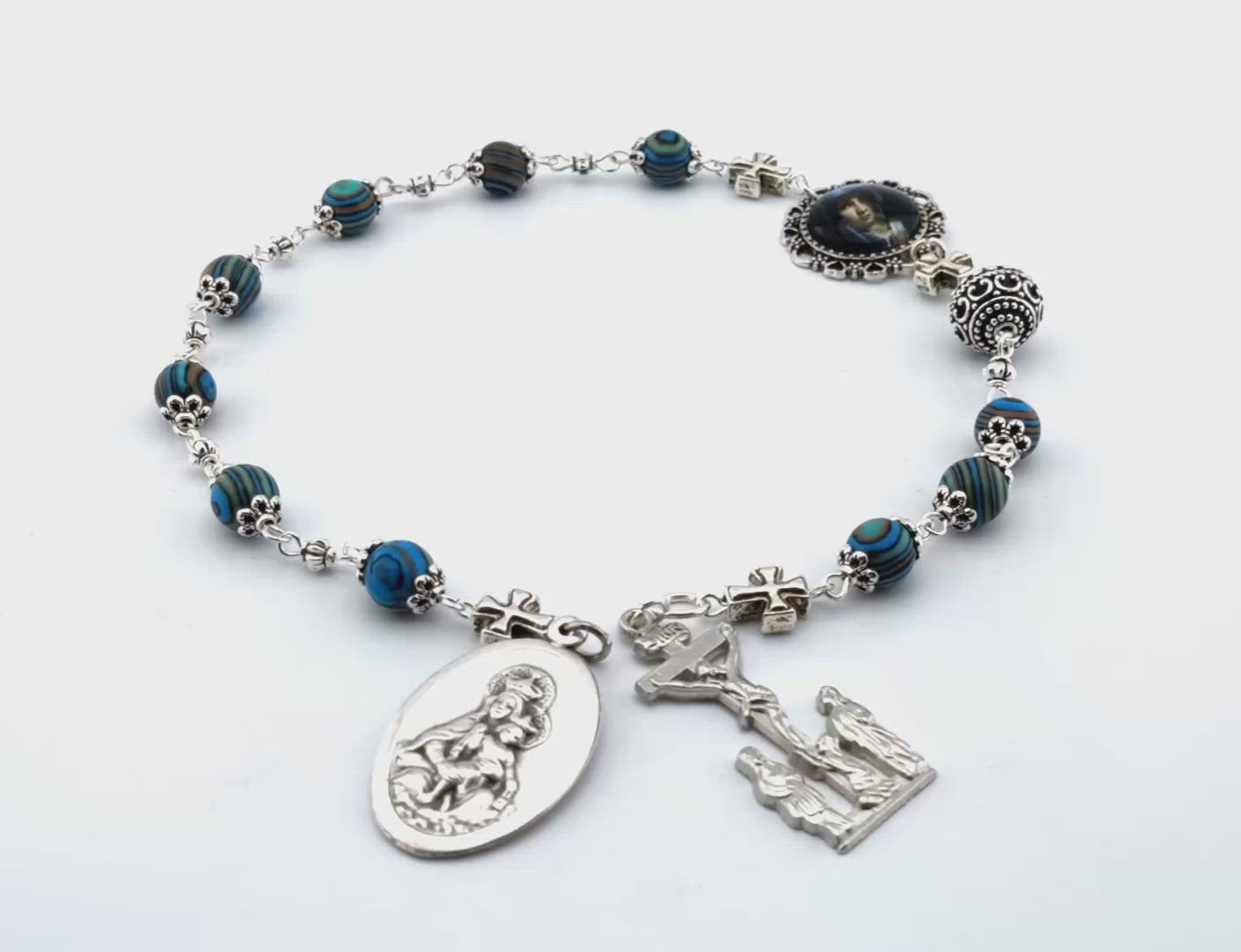 Our Lady of Sorrows unique rosary beads servite dolor rosary prayer chaplet with malachite gemstone beads, silver crucifix, Our Lady of Mount Carmel medal and small picture medal.