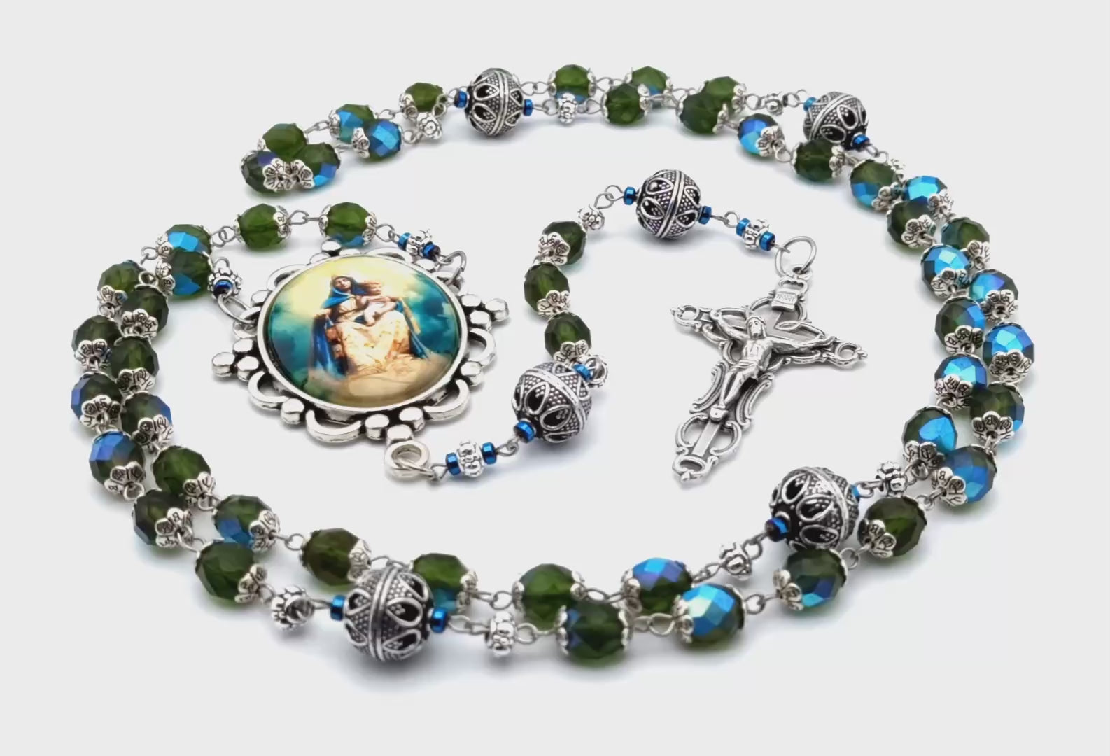 Our Lady of Mount Carmel unique rosary beads with blue green faceted glass and silver beads, filigree crucifix and large picture centre medal.