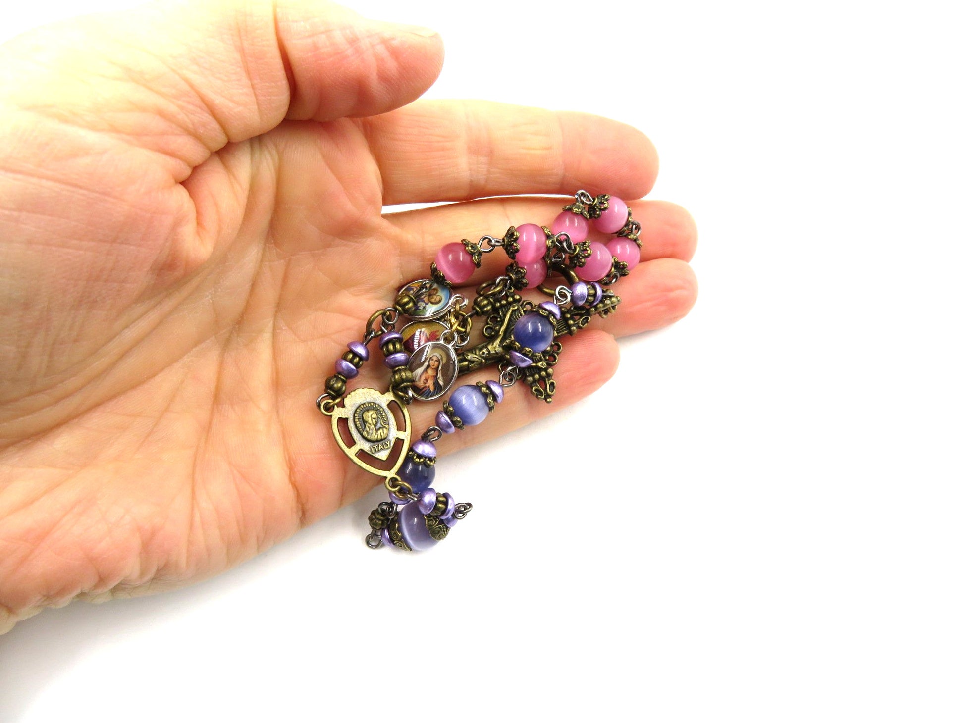 Pocket servite unique dolor rosary in pink and blue glass beads and bronze crucifix and medal.