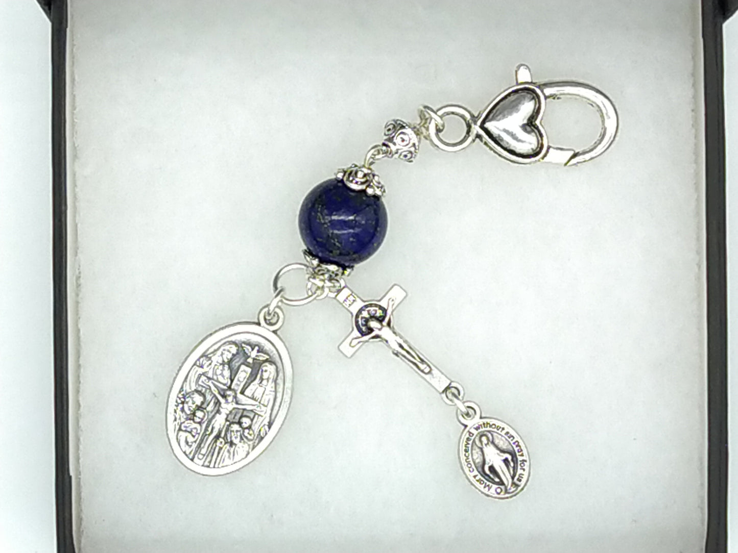 I am a catholic in case of a serious accident Call a Priest medal purse clip, Holy Trinity Key chain medal, Our Lady of Mount Carmel medal.