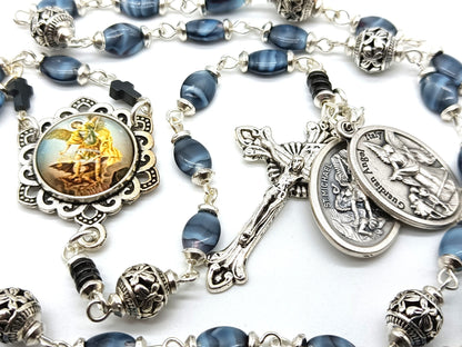 Saint Michael unique rosary beads prayer chaplet with blue glass beads and silver crucifix, Saint Michael picture medal and silver bead caps.