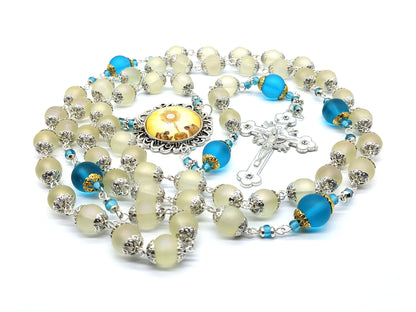 Confirmation unique rosary beads with frosted off white and blue glass beads, silver and white enamel crucifix and picture centre medal.