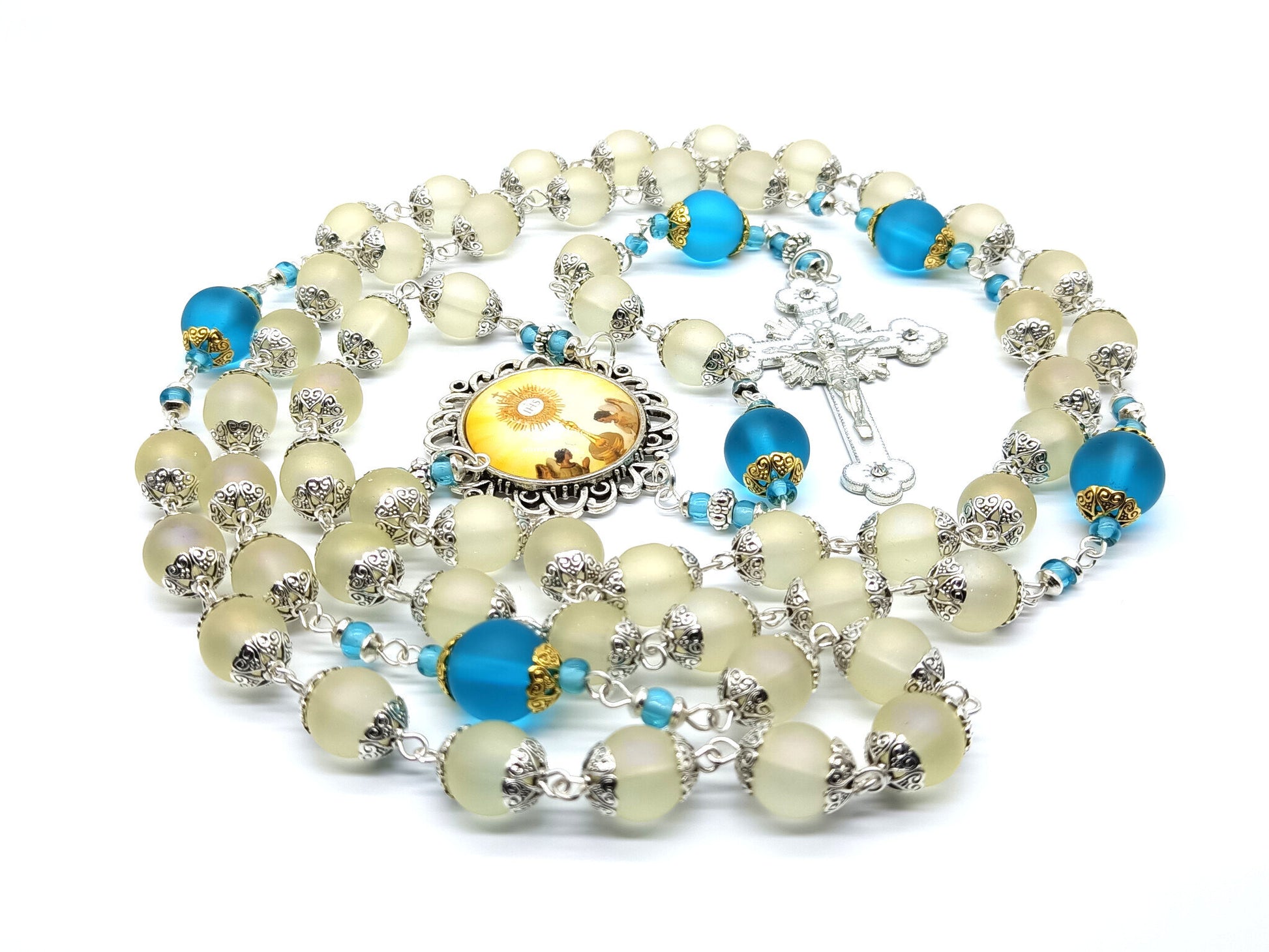 Confirmation unique rosary beads with frosted off white and blue glass beads, silver and white enamel crucifix and picture centre medal.