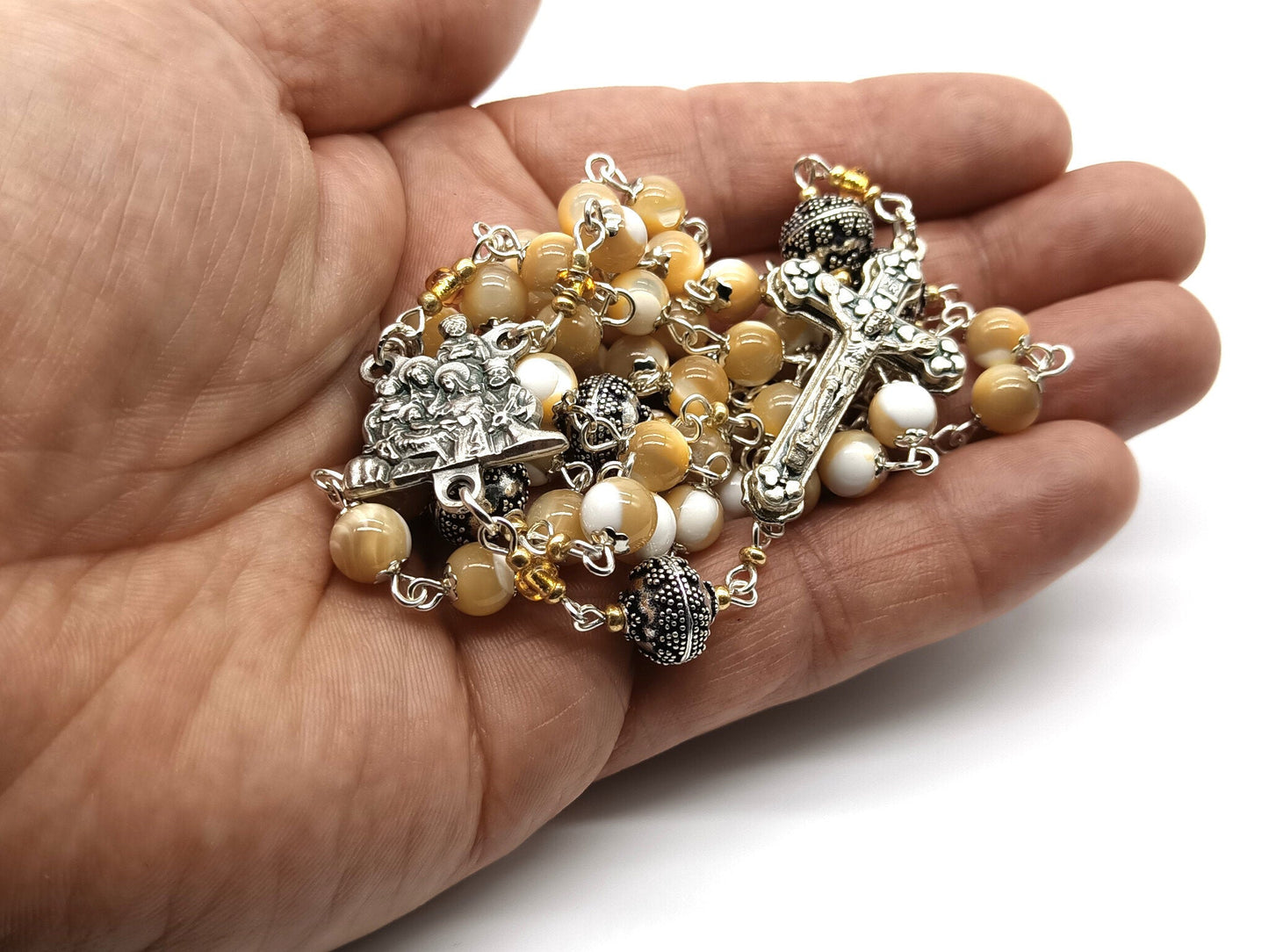 The Nativity unique rosary beads with mother of pearl and silver beads, silver crucifix and centre medal.