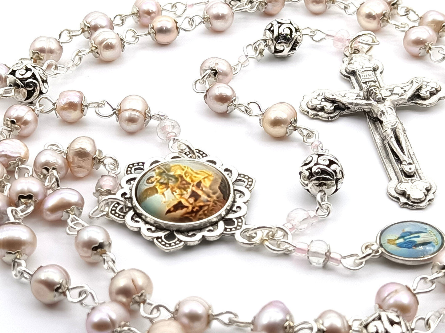 Genuine mother of pearl unique rosary beads with silver crucifix, Saint Michael picture centre medal, silver pater beads and bead caps.