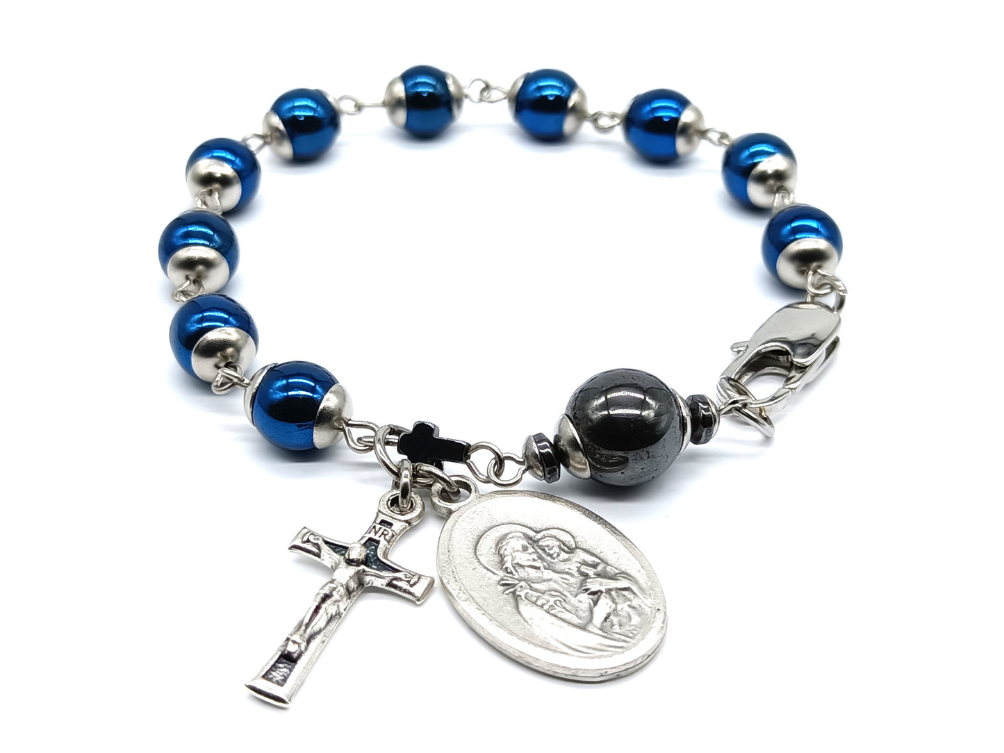 Saint Joseph unique rosary beads single decade with blue gemstone hematite beads, stainless steel bead caps and clasp, silver crucifix and St. Joseph medal.