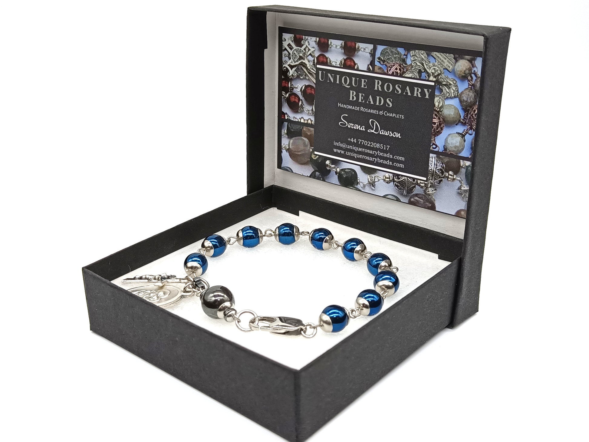 Saint Joseph unique rosary beads single decade with blue gemstone hematite beads, stainless steel bead caps and clasp, silver crucifix and St. Joseph medal.