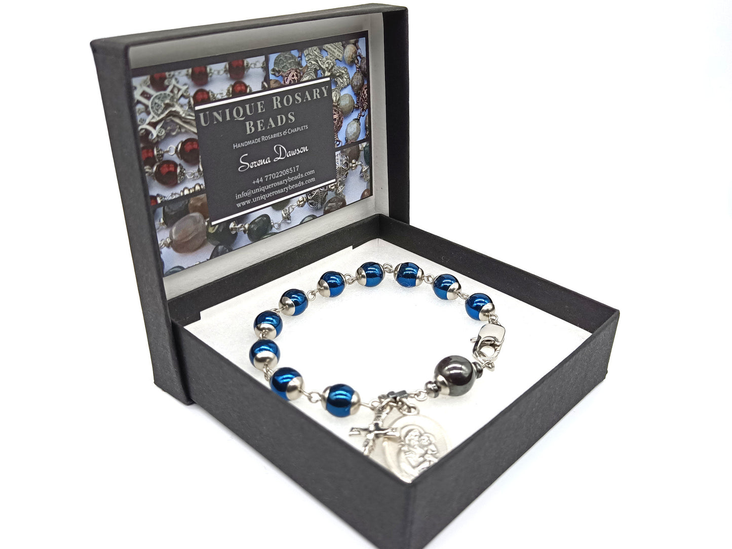 Saint Joseph unique rosary beads single decade with blue gemstone hematite beads, stainless steel bead caps and clasp, silver crucifix and St. Joseph medal.