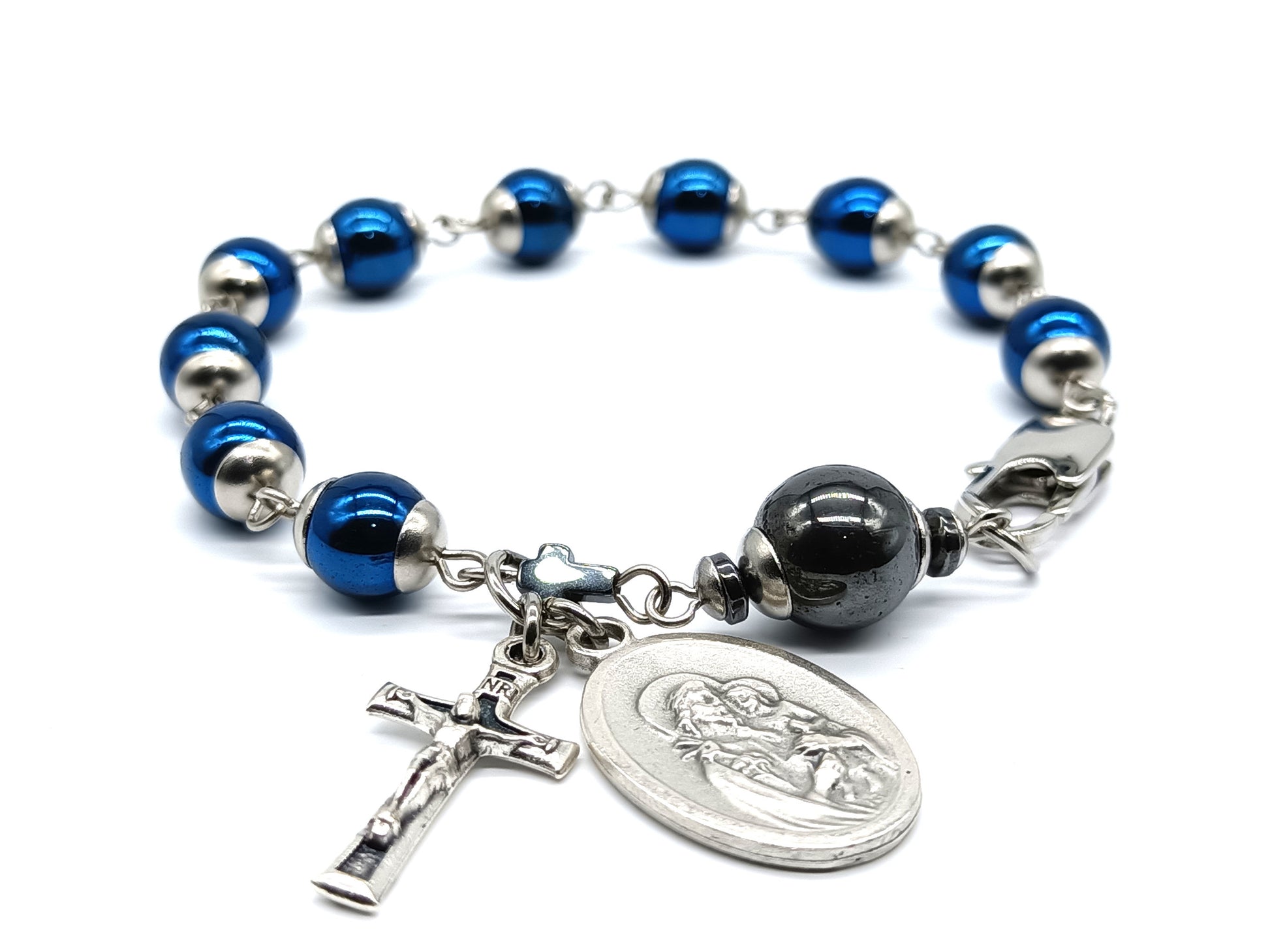 Saint Joseph unique rosary beads single decade with blue gemstone hematite beads, stainless steel bead caps and clasp, silver crucifix and St. Joseph medal.