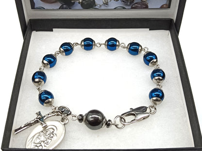 Saint Joseph unique rosary beads single decade with blue gemstone hematite beads, stainless steel bead caps and clasp, silver crucifix and St. Joseph medal.