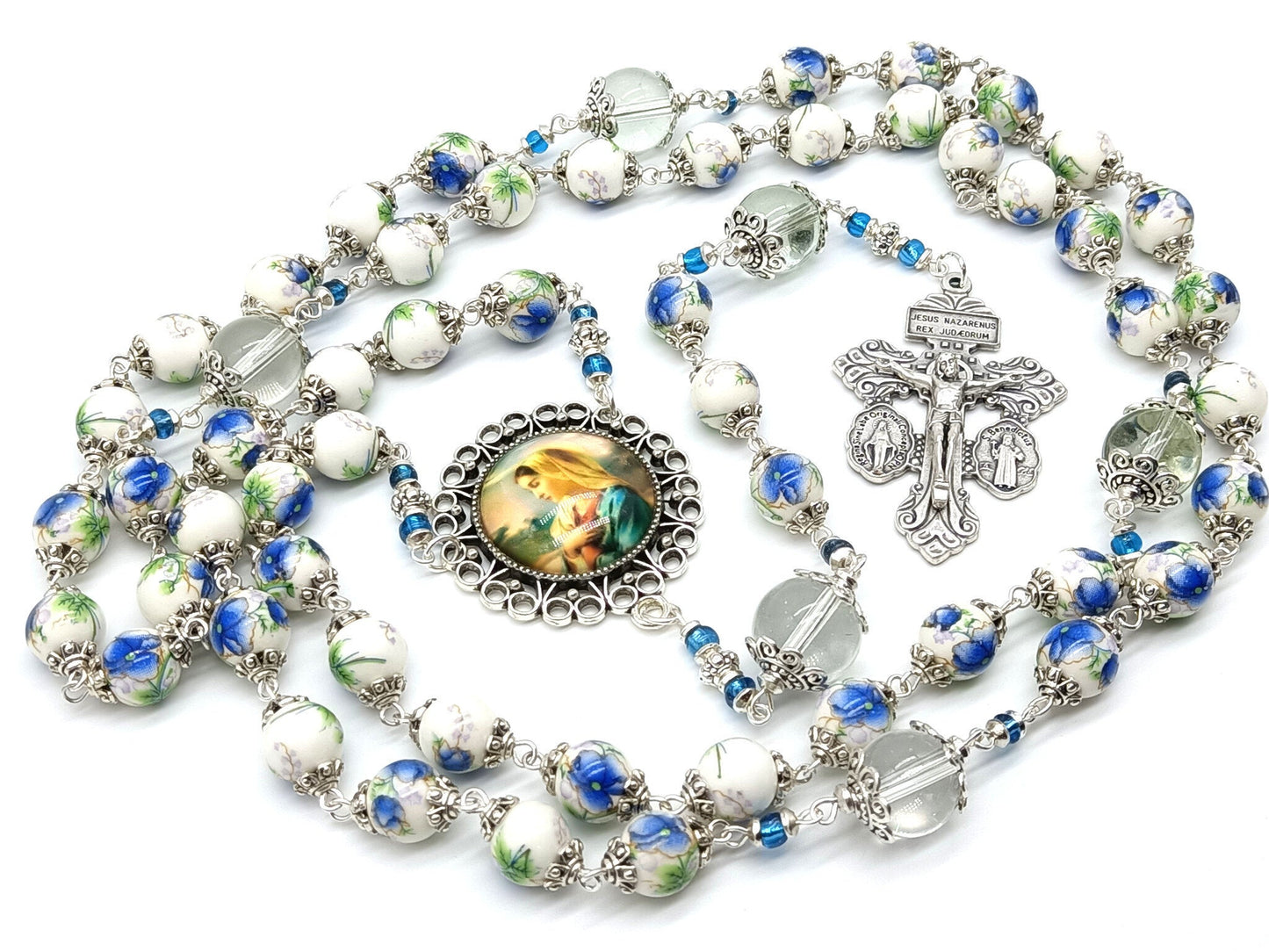 Porcelain unique rosary beads with silver pardon crucifix, Virgin Mary centre medal and glass pater beads.