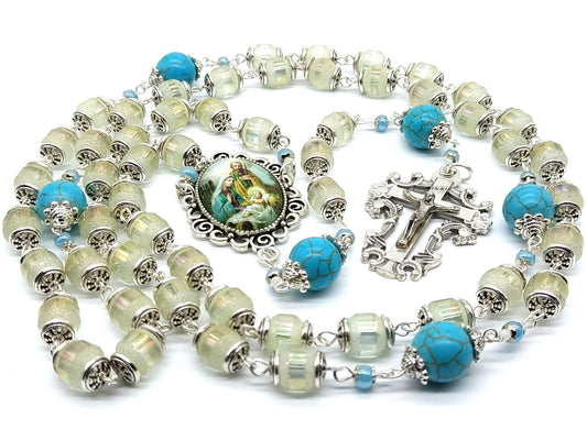 Holy Family unique rosary beads with frosted glass beads, blue gemstone pater beads, silver crucifix and picture centre medal. 