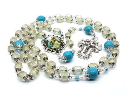 Holy Family unique rosary beads with frosted glass beads, blue gemstone pater beads, silver crucifix and picture centre medal. 