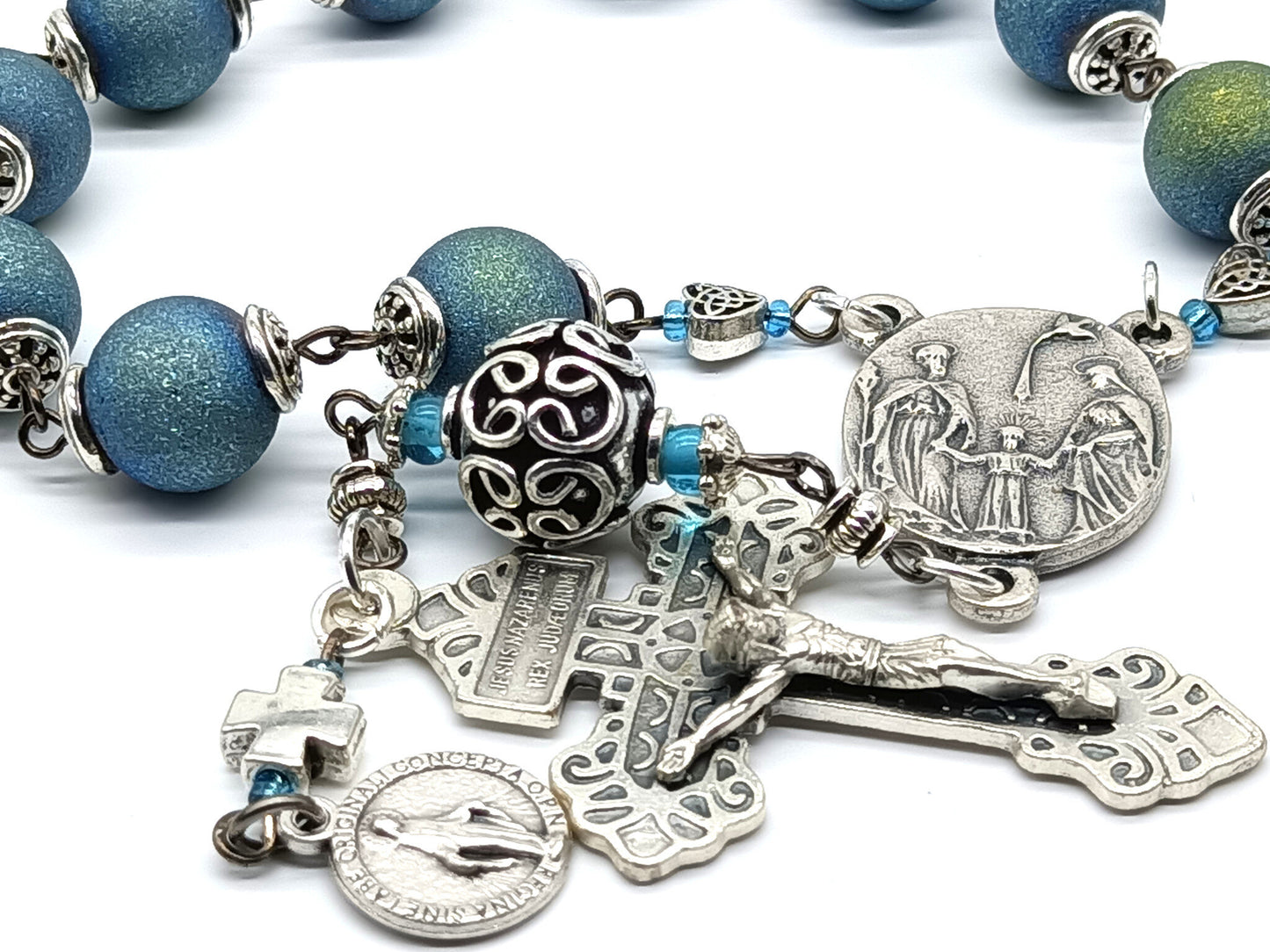 Three Heart of Jesus, Mary and Joseph unique rosary beads single decade with silver pardon crucifix, pater bead, centre medal and blue textured beads.