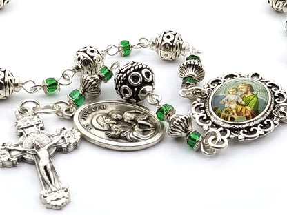 Saint Joseph unique rosary beads single decade with silver and green glass beads, silver crucifix and St. Joseph picture centre medal.