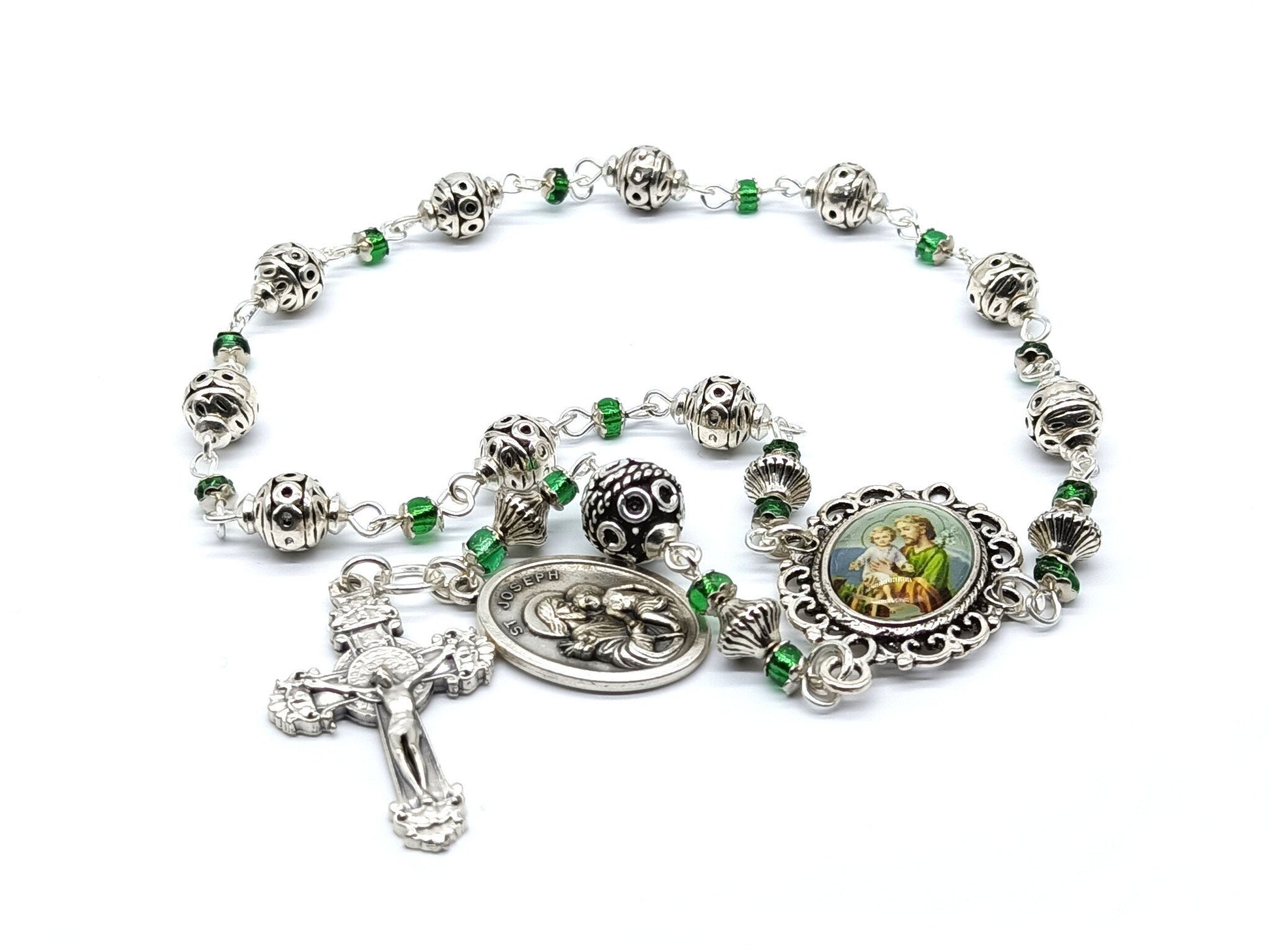 Saint Joseph unique rosary beads single decade with silver and green glass beads, silver crucifix and St. Joseph picture centre medal.