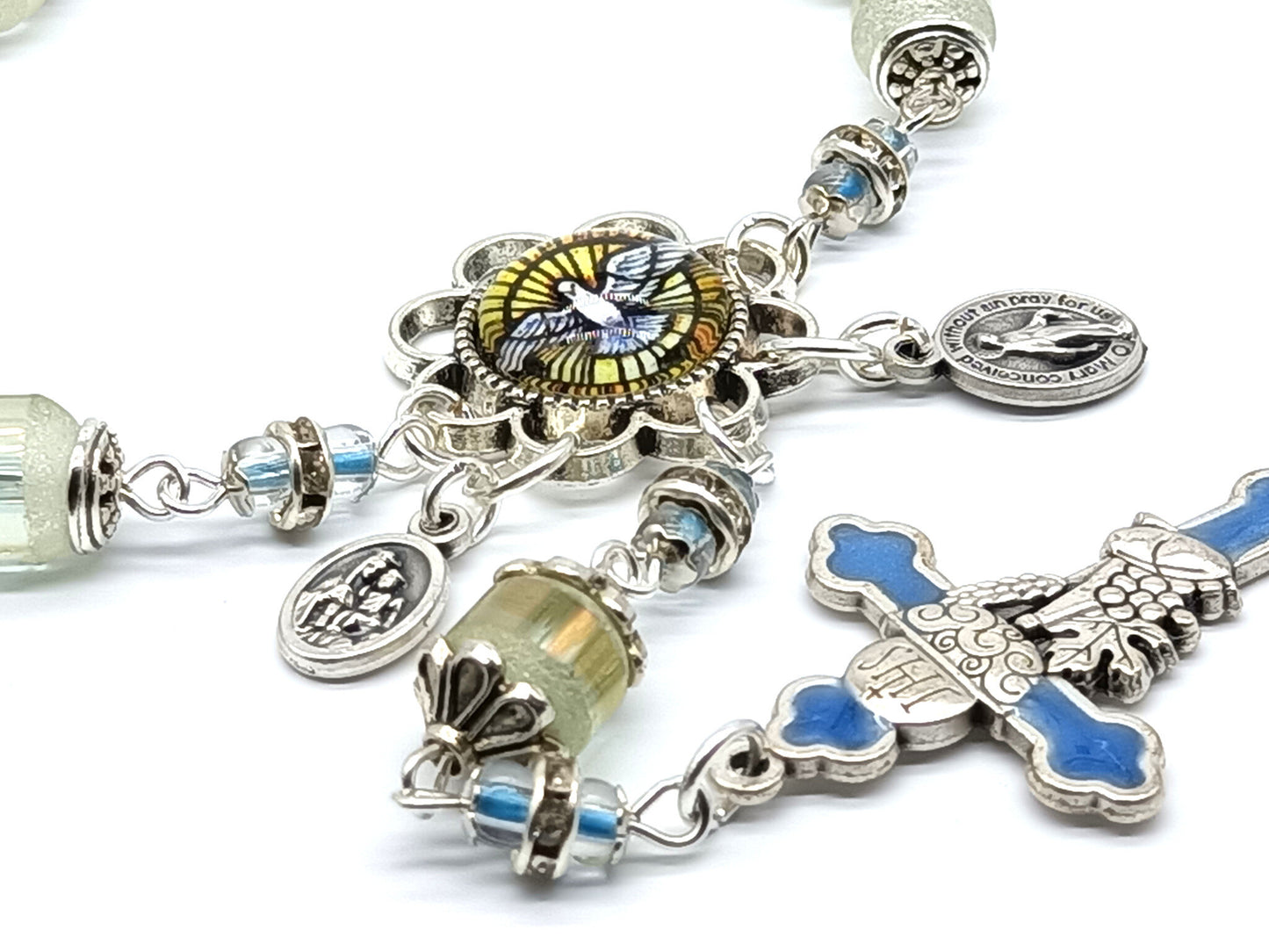 Holy Spirit unique rosary beads single decade with frosted glass beads, silver and blue enamel crucifix, silver Holy Spirit picture centre medal and small miraculous medal.