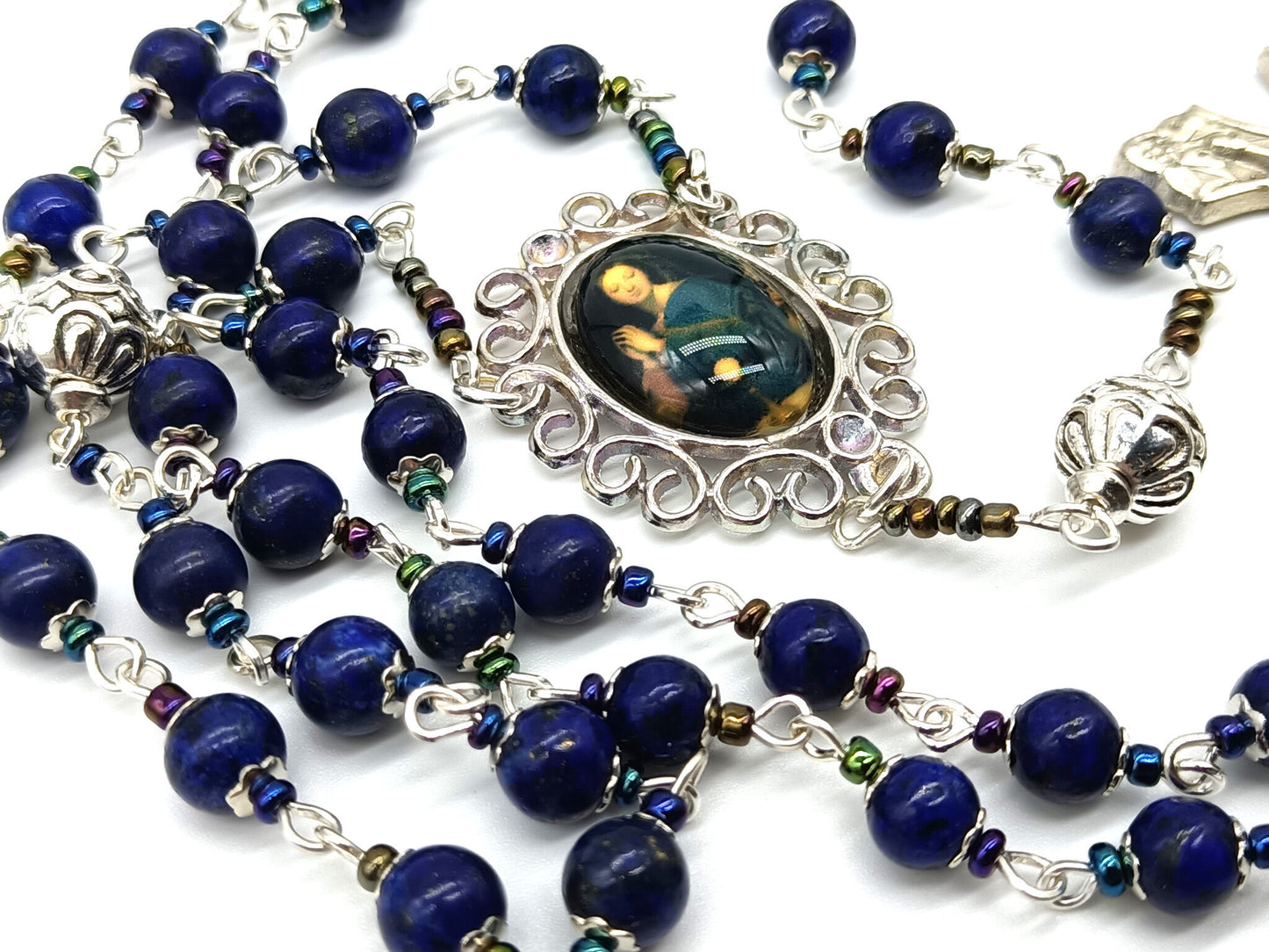 Lapis Lazuli unique rosary beads with silver crucifix, pater beads and Virgin Mary picture centre medal.