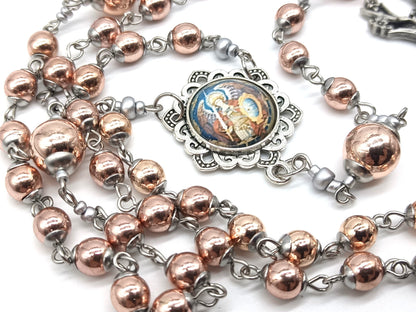 Saint Michael unique rosary beads with rose gold hematite beads and pewter dogwood crucifix, silver Saint Michael picture centre medal and silver bead caps.