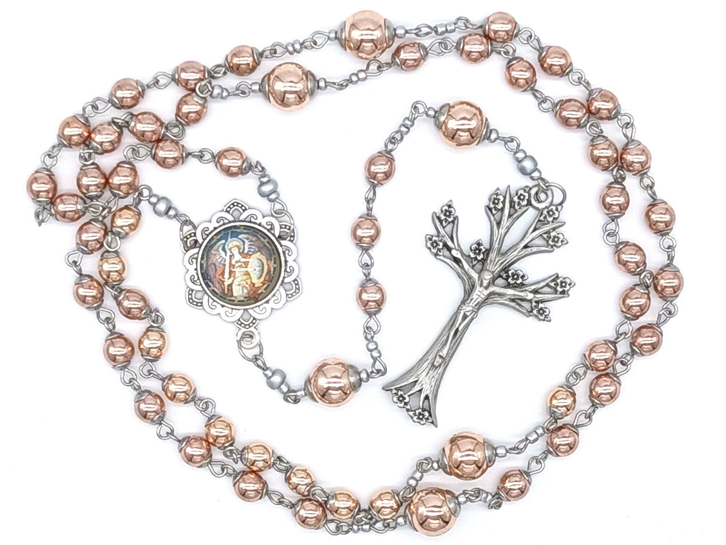 Saint Michael unique rosary beads with rose gold hematite beads and pewter dogwood crucifix, silver Saint Michael picture centre medal and silver bead caps.
